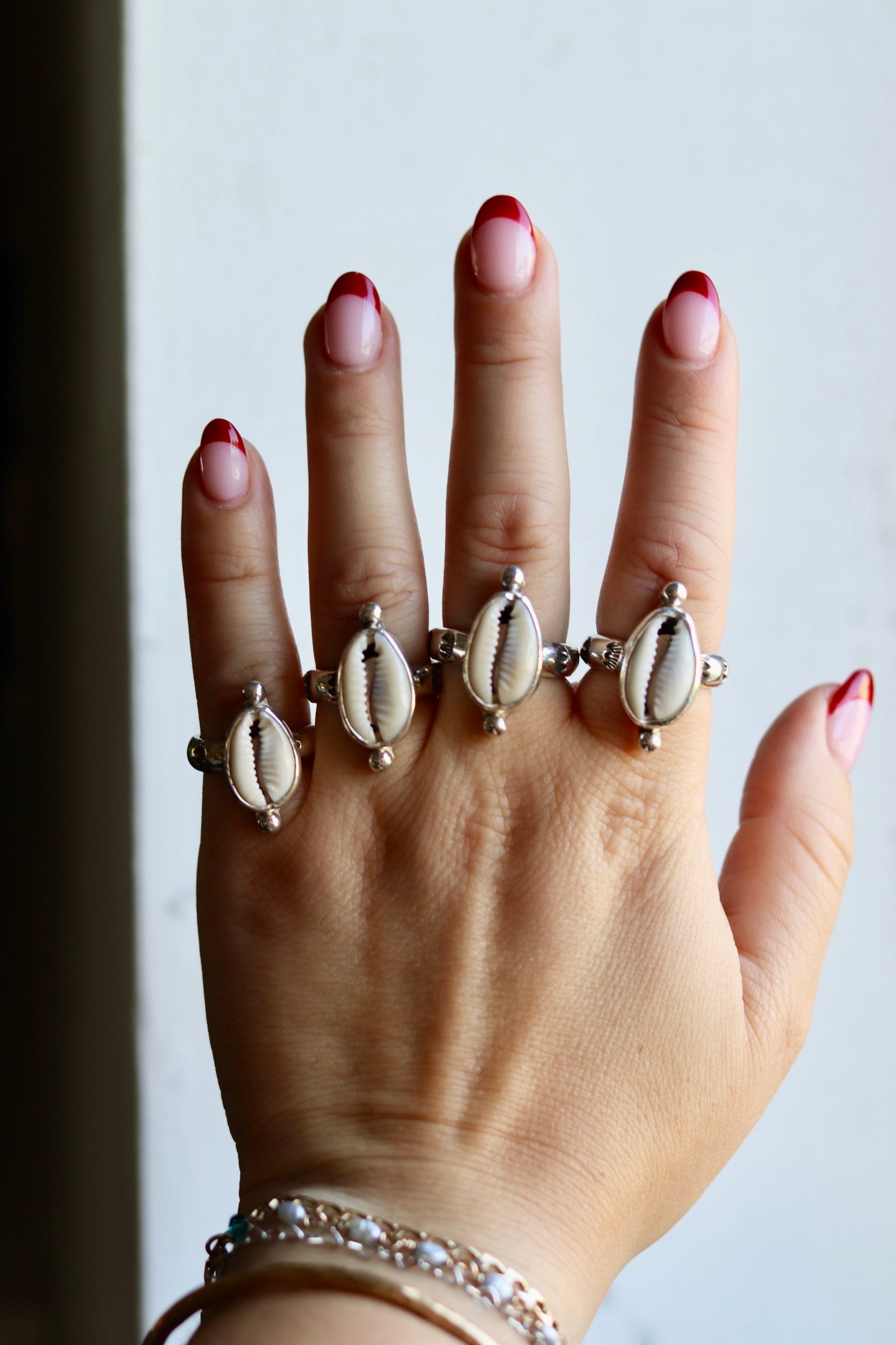 Cowrie sun rings