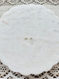 Mini pearl charms
