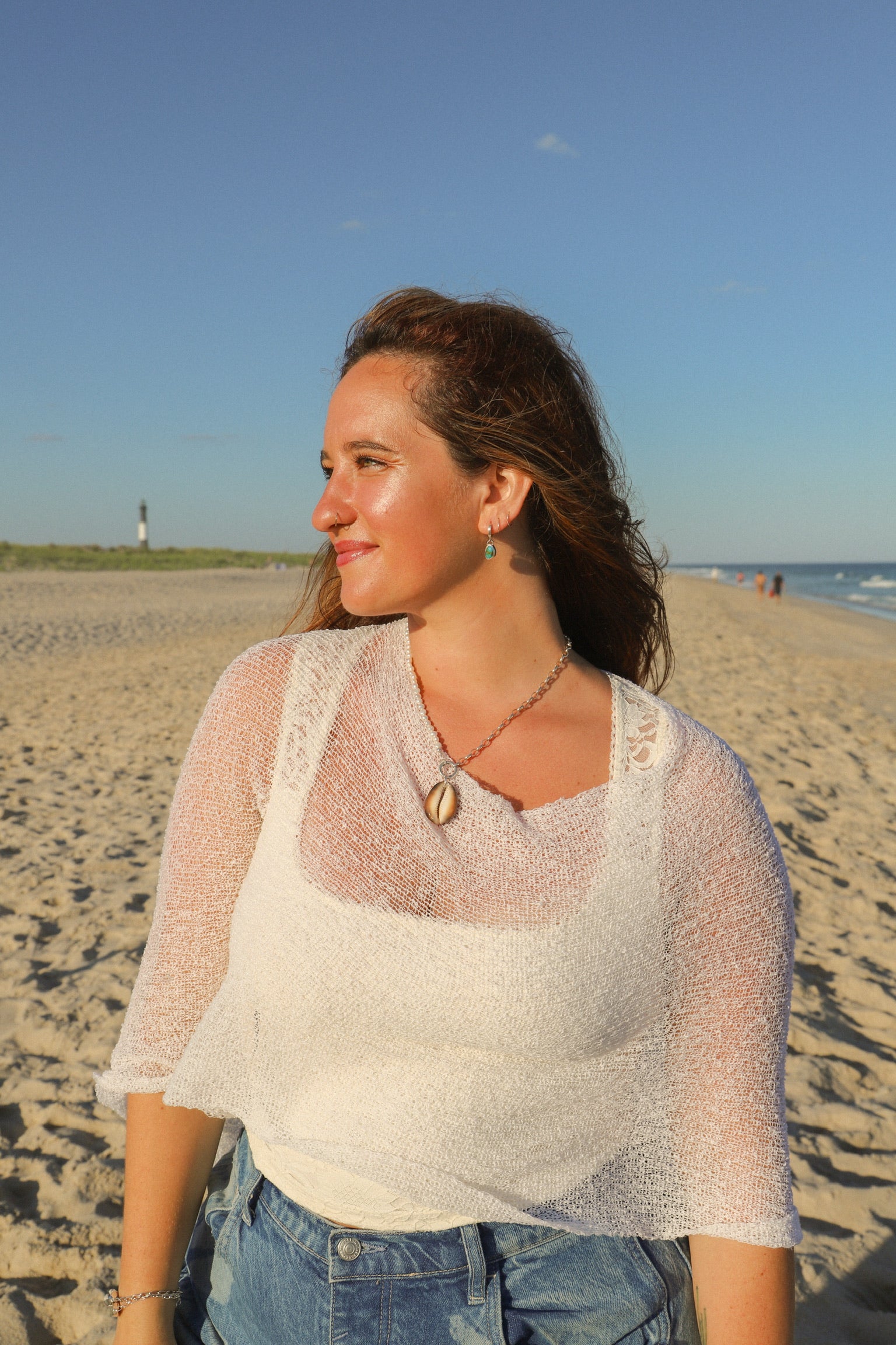 Pearl + silver charm keeper with cowrie charm