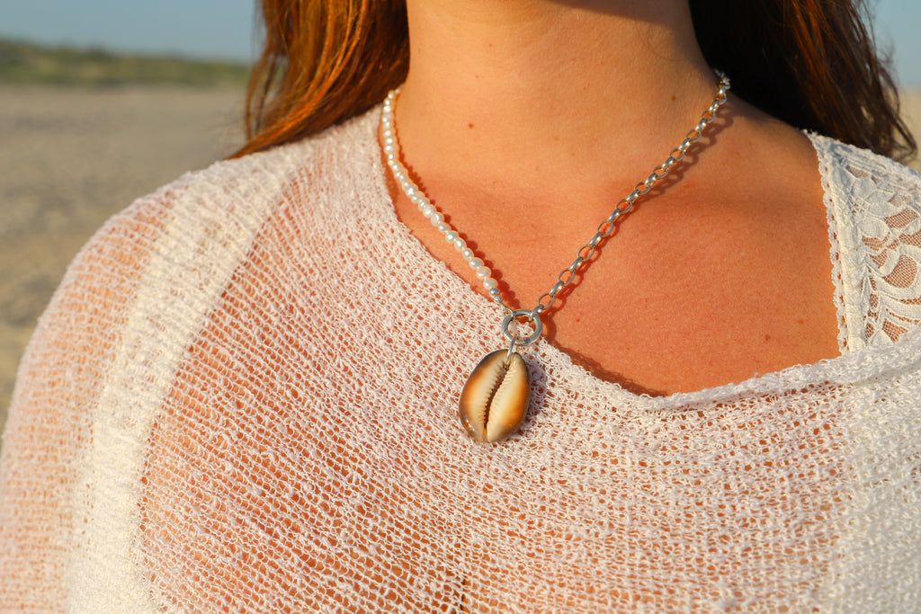 Pearl + silver charm keeper with cowrie charm